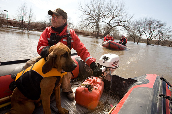 Valley Water Rescue member, Mike Knorr and search dog, 'Barnaby', in North Dakota